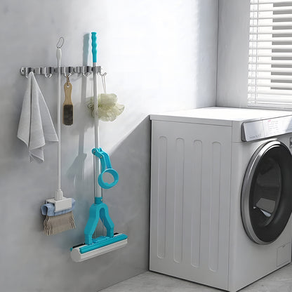 MopDock™ – Suporte Premium de Parede para Vassouras e Rodos